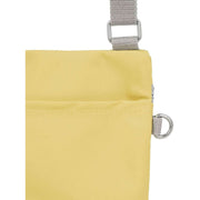 Roka Chelsea Sustainable Nylon Pocket Sling Bag - Bamboo Yellow