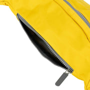 Roka Jubilee Medium Recycled Nylon Sling Bag - Mustard Yellow