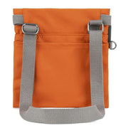 Roka Stratford Recycled Nylon Sling Bag - Burnt Orange